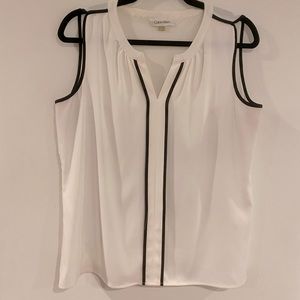 White and black V-neck sleeveless shirt